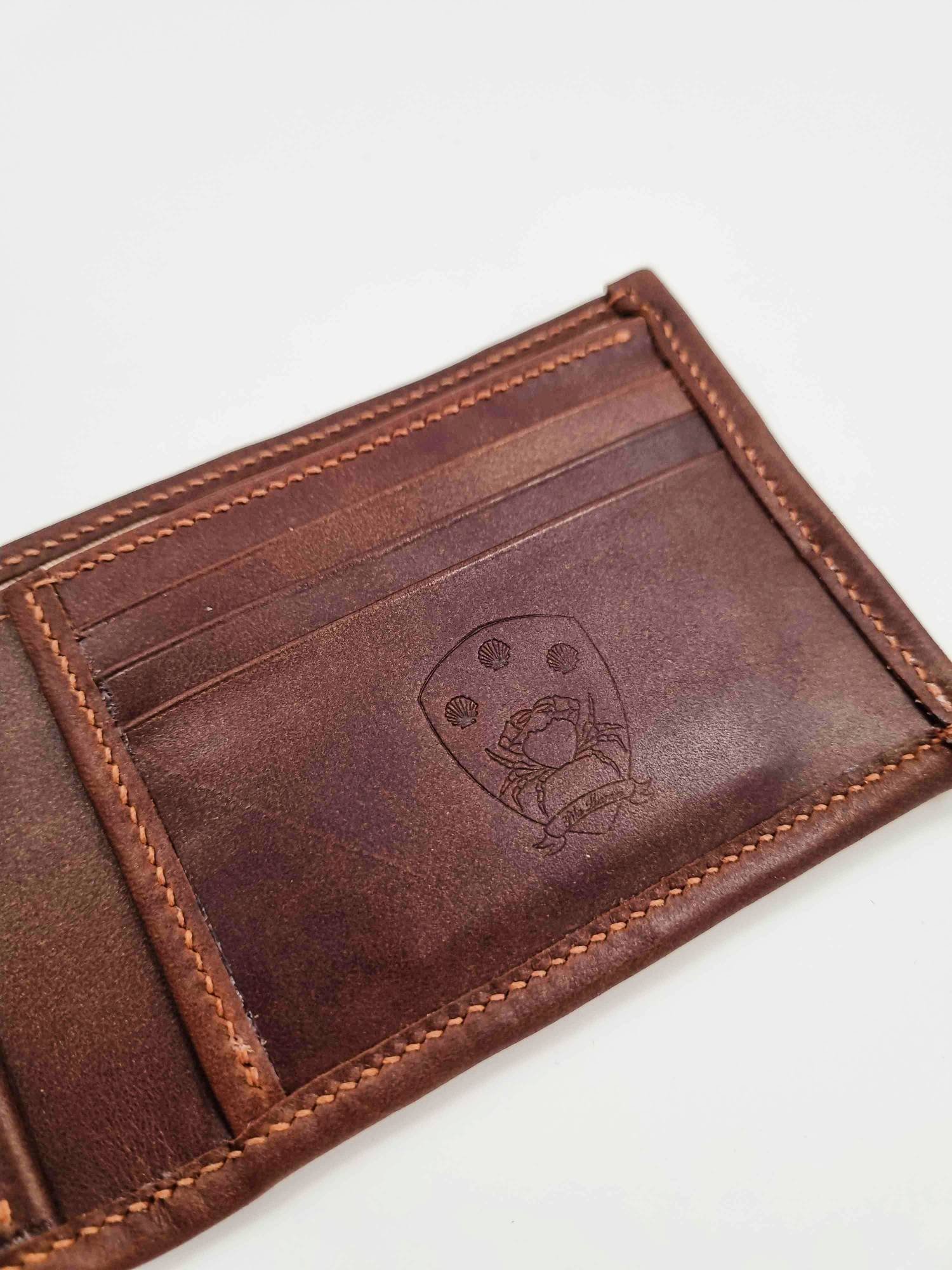 Brown leather wallet with Pila Luxuria emblem logo