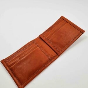 Brown leather wallet laying flat showing card slots
