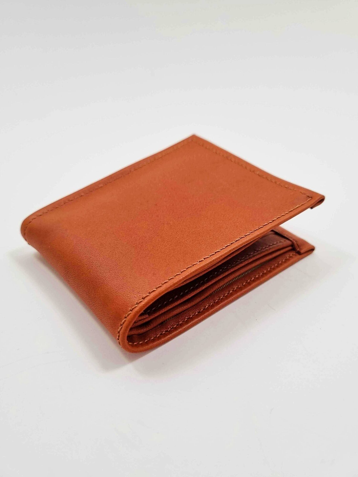 Brown leather wallet with white background