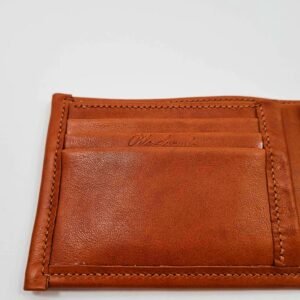 Brown leather wallet left side with script logo.