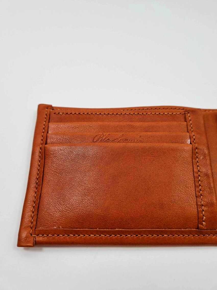 Brown leather wallet left side with script logo.