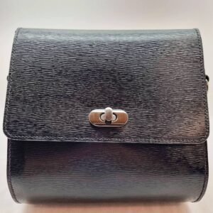 A black epi leather purse made by Pila Luxuria in Alberta, Canada displayed from the front.