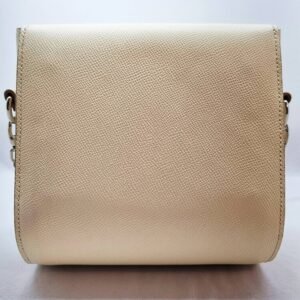 A craie colored epsom leather purse made by Pila Luxuria in Alberta, Canada displayed from the rear.