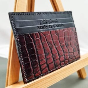 Angled view of a luxury alligator leather card holder, made by Pila Luxuria in Canada.