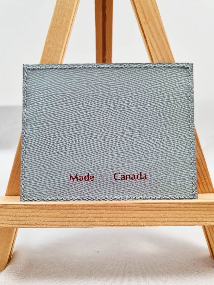 Grey saffiano calfskin wallet with Made in Canada text