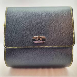 A black and yellow epsom leather purse made by Pila Luxuria in Alberta, Canada displayed from the front.