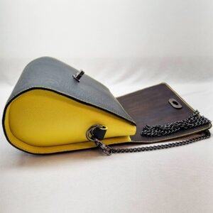 A black and yellow epsom leather purse made by Pila Luxuria in Alberta, Canada laid open.