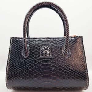 An exotic black python leather handbag made by Pila Luxuria in Alberta, Canada shown from the front.