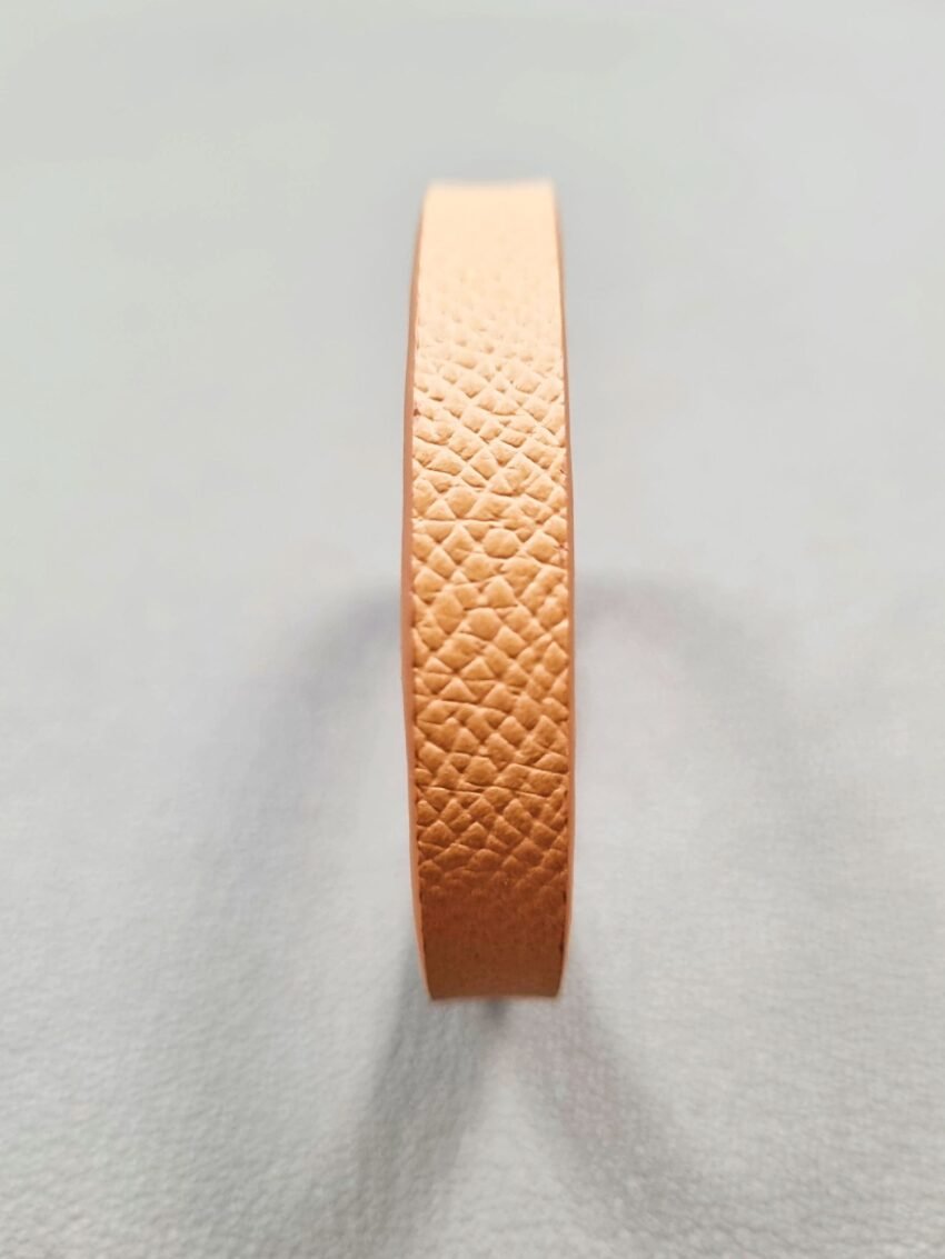 Front view of a luxury biscuit epsom leather bracelet with a magnetic clasp, made by Pila Luxuria in Canada.