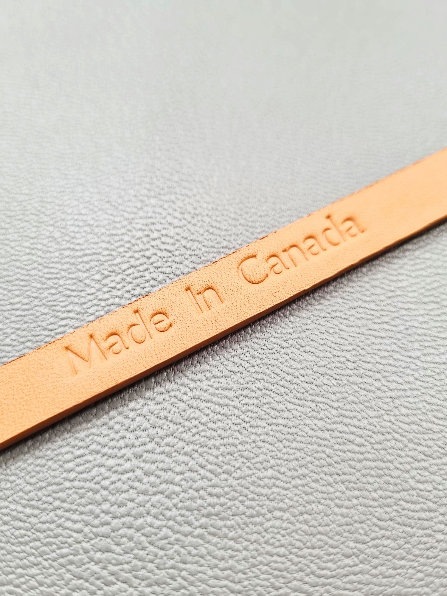 Made In Canada logo of a luxury biscuit epsom leather bracelet with a magnetic clasp, made by Pila Luxuria in Canada.