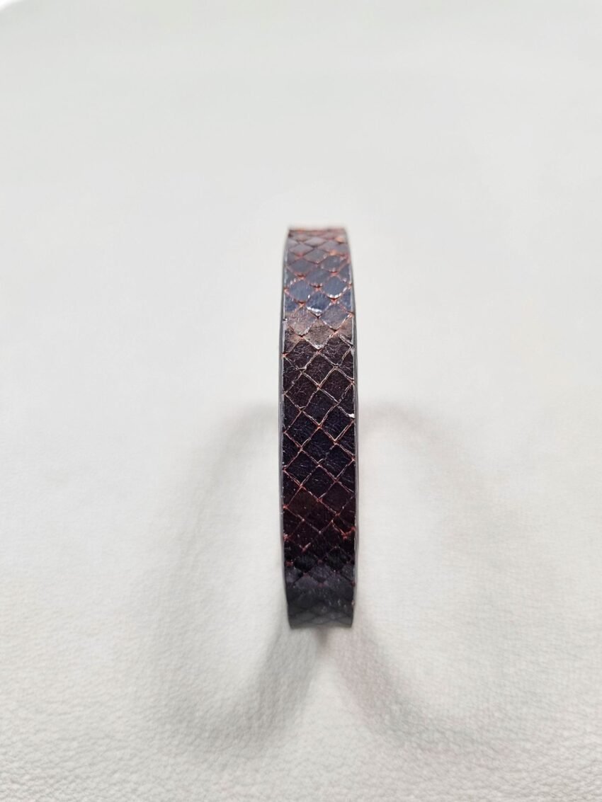 Forward view of a luxury tarnished python leather bracelet with a magnetic clasp, made by Pila Luxuria in Canada.