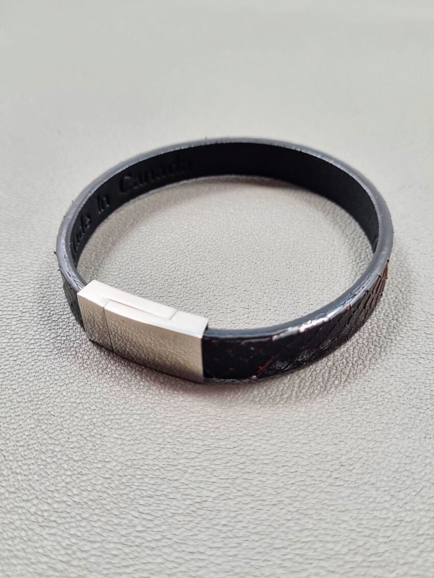 Top view of a luxury tarnished python leather bracelet with a magnetic clasp, made by Pila Luxuria in Canada.