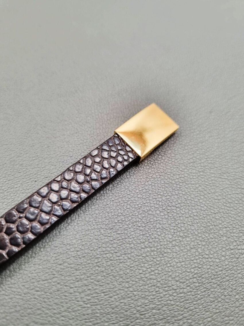 Ostrich leather bracelet with a gold magnetic clasp, made by Pila Luxuria in Canada.
