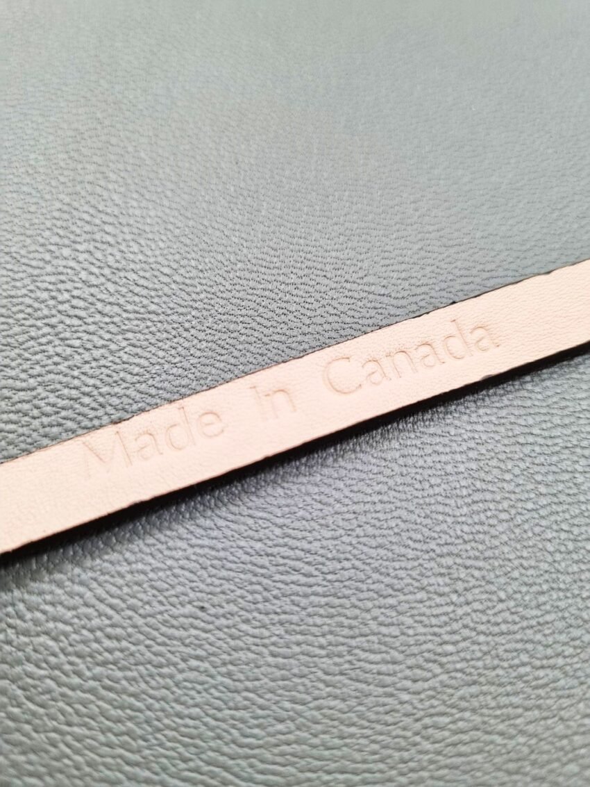 Made In Canada logo of a luxury brown ostrich leather bracelet with a magnetic clasp, made by Pila Luxuria in Canada.