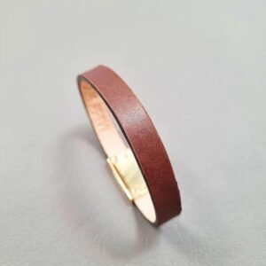 Angled view of a luxury brown calfskin bracelet with a magnetic clasp, made by Pila Luxuria in Canada.