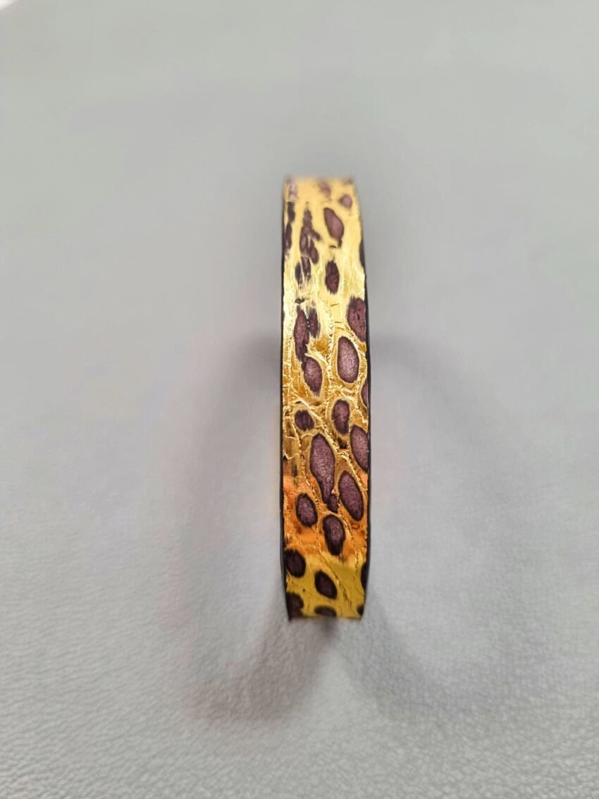 Forward view of a luxury brushed gold crocodile leather bracelet with a magnetic clasp, made by Pila Luxuria in Canada.