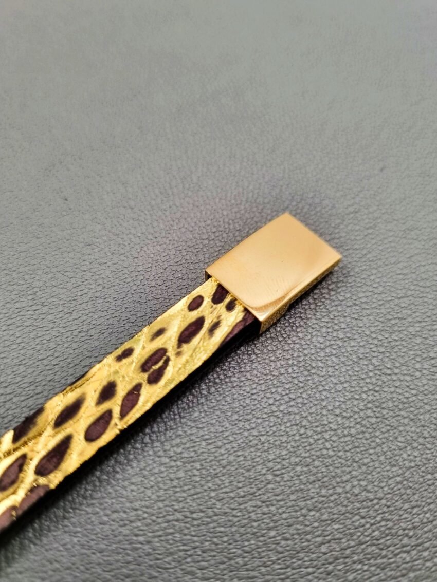 Brushed gold crocodile leather bracelet with a gold magnetic clasp, made by Pila Luxuria in Canada.
