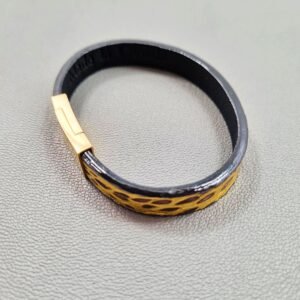 Top view of a luxury brushed gold crocodile leather bracelet with a magnetic clasp, made by Pila Luxuria in Canada.