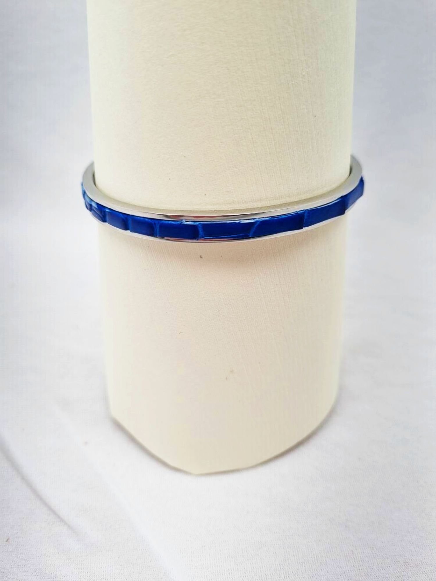 Luxury blue crocodile clasp bracelet, made by Pila Luxuria in Canada.