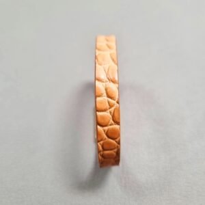 Front view of a luxury cognac crocodile bracelet with a magnetic clasp, made by Pila Luxuria in Canada.