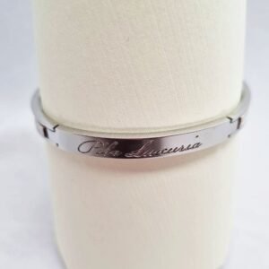 Stainless steel bracelet with cream saffiano leather and Pila Luxuria inscribed logo.