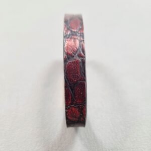 Forward view of a luxury black and red alligator leather bracelet with a magnetic clasp, made by Pila Luxuria in Canada.