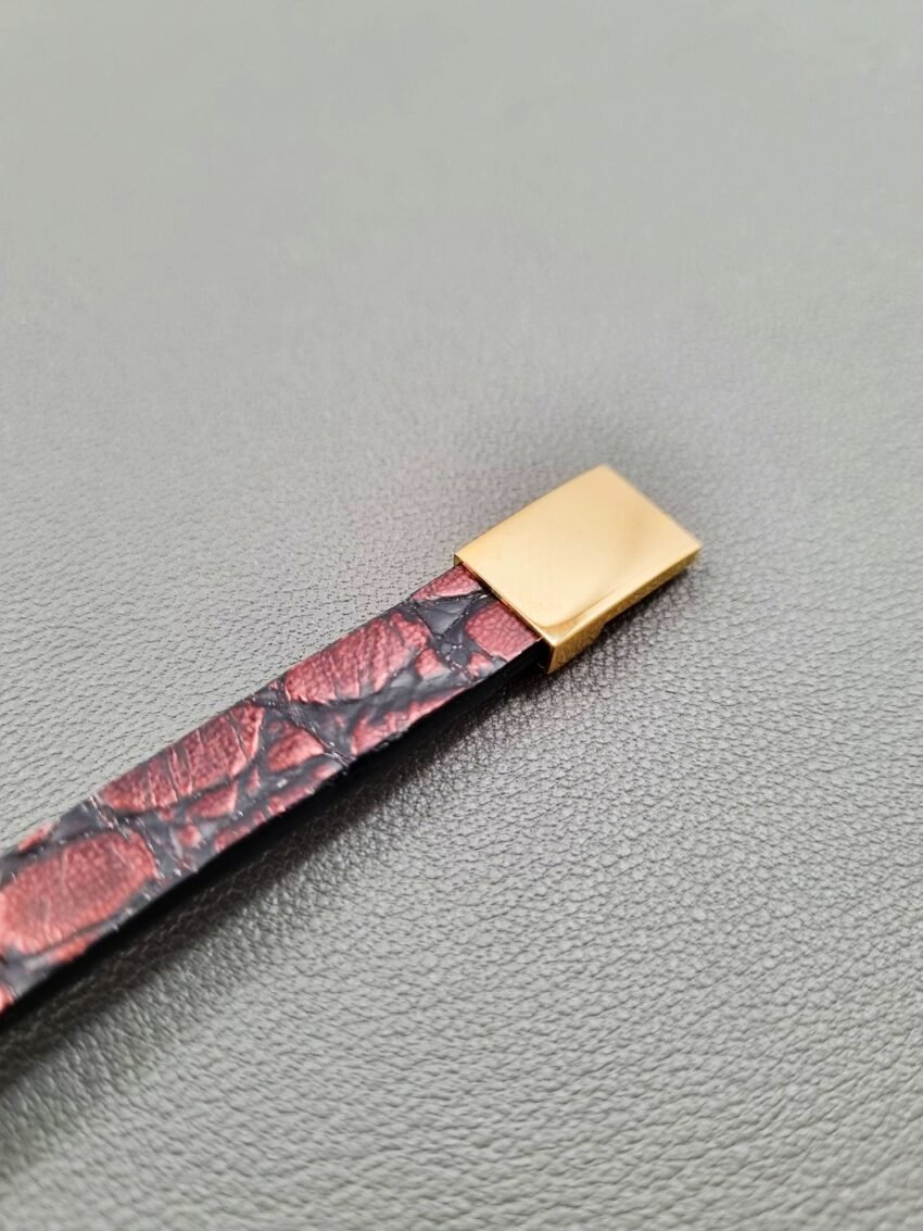 Alligator leather bracelet with a gold magnetic clasp, made by Pila Luxuria in Canada.