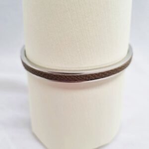 Stainless steel bracelet with etoupe epsom leather inlay.