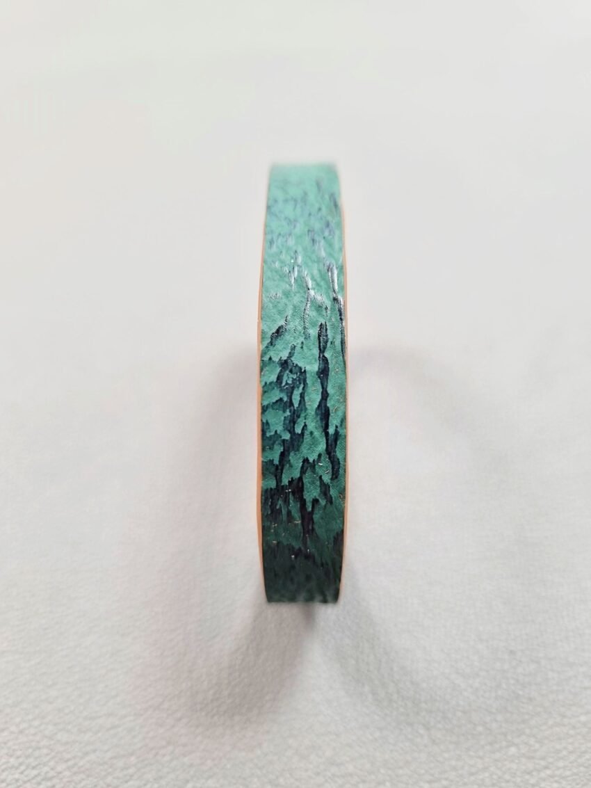 Forward view of a luxury green shark leather bracelet with a magnetic clasp, made by Pila Luxuria in Canada.