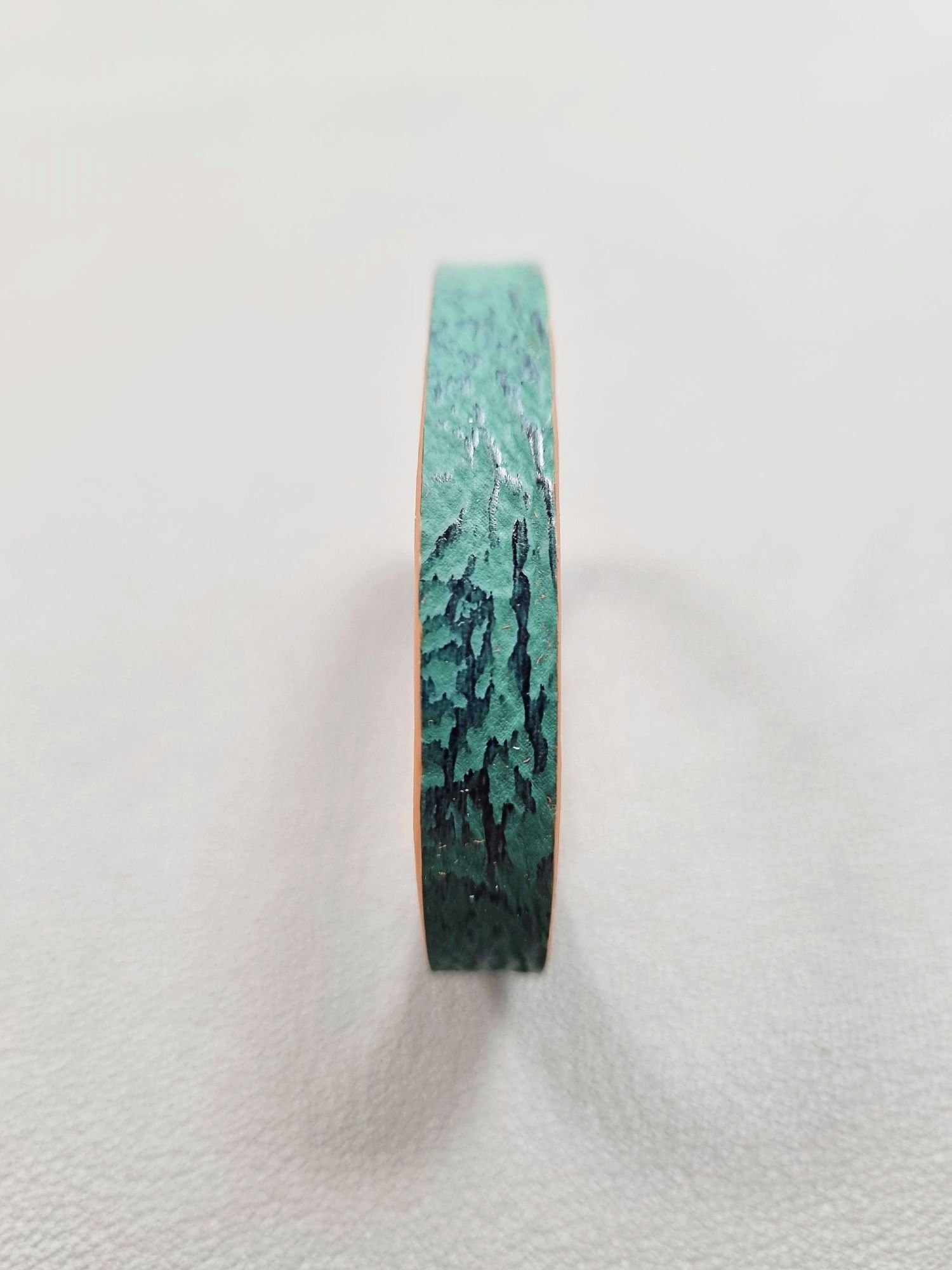 Forward view of a luxury green shark leather bracelet with a magnetic clasp, made by Pila Luxuria in Canada.