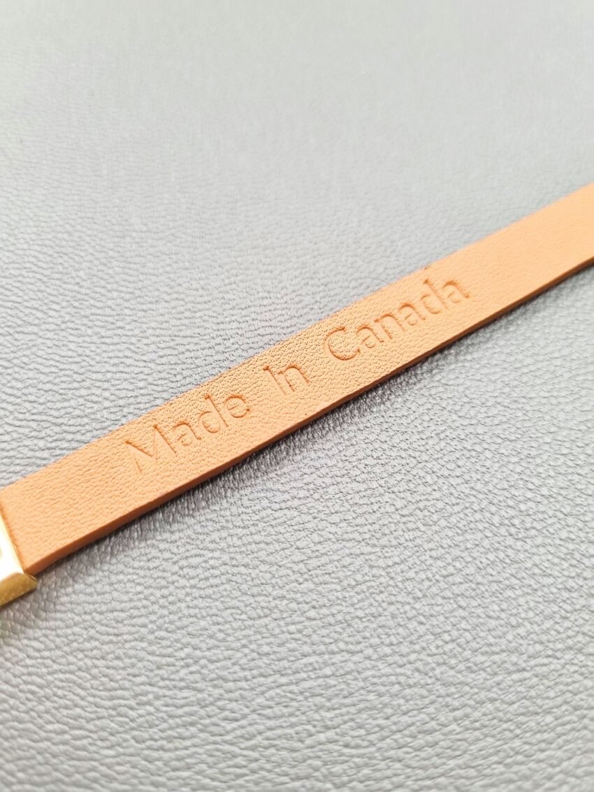 Made in Canada logo of a luxury green shark leather bracelet with a magnetic clasp, made by Pila Luxuria in Canada.