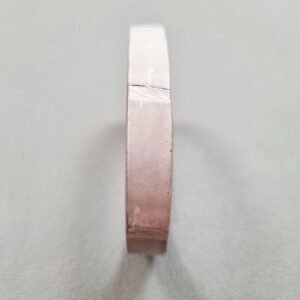 Forward view of a luxury grey crocodile bracelet with a magnetic clasp, made by Pila Luxuria in Canada.