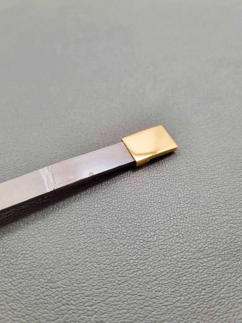 Luxury grey crocodile leather bracelet with gold magnet clasp.