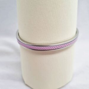 Stainless steel bracelet with pink caviar leather inlay.