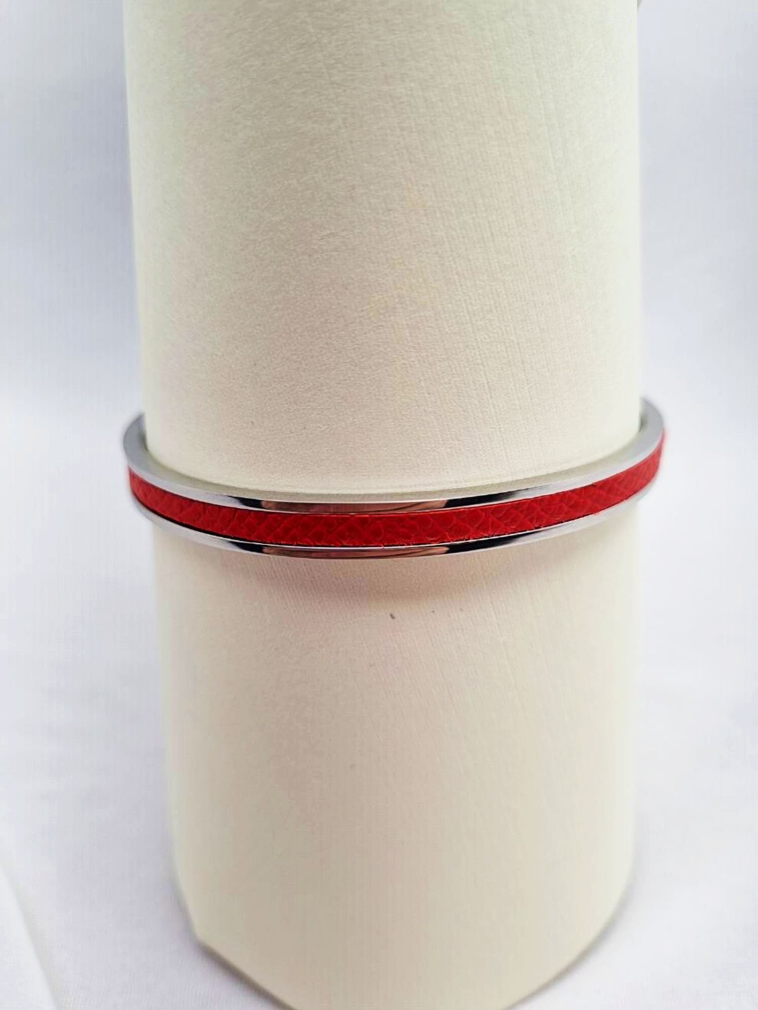 Luxury red epsom clasp bracelet, made by Pila Luxuria in Canada.