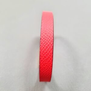 Forward view of a luxury red epsom leather bracelet with a magnetic clasp, made by Pila Luxuria in Canada.