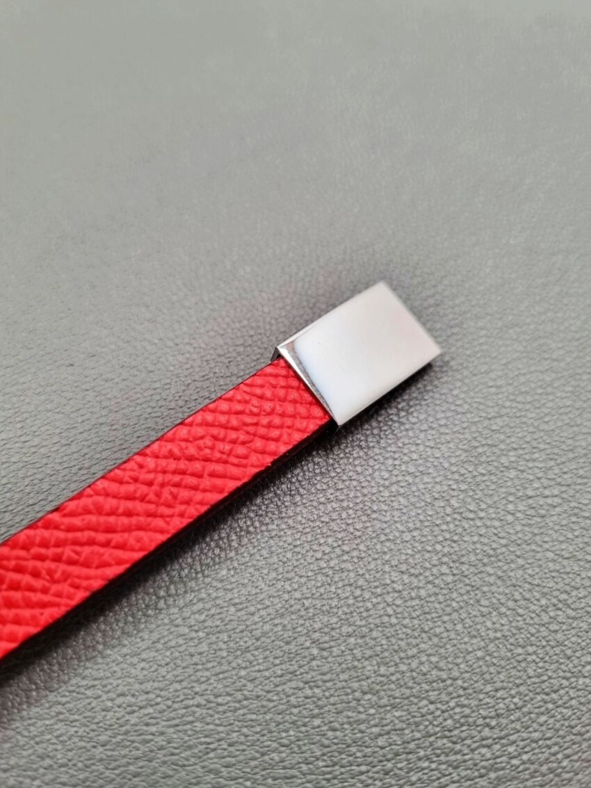Red epi leather bracelet with a silver magnetic clasp, made by Pila Luxuria in Canada.