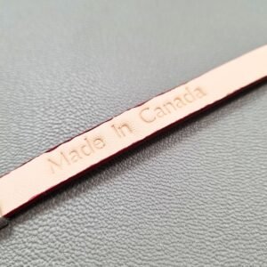 Made In Canada logo of a luxury red goatskin leather bracelet with a magnetic clasp, made by Pila Luxuria in Canada.