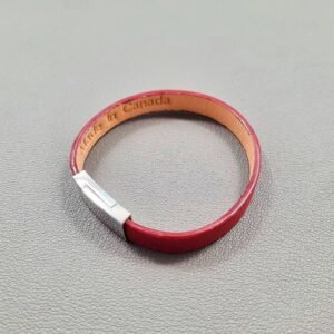 Top view of a luxury red goatskin leather bracelet with a magnetic clasp, made by Pila Luxuria in Canada.