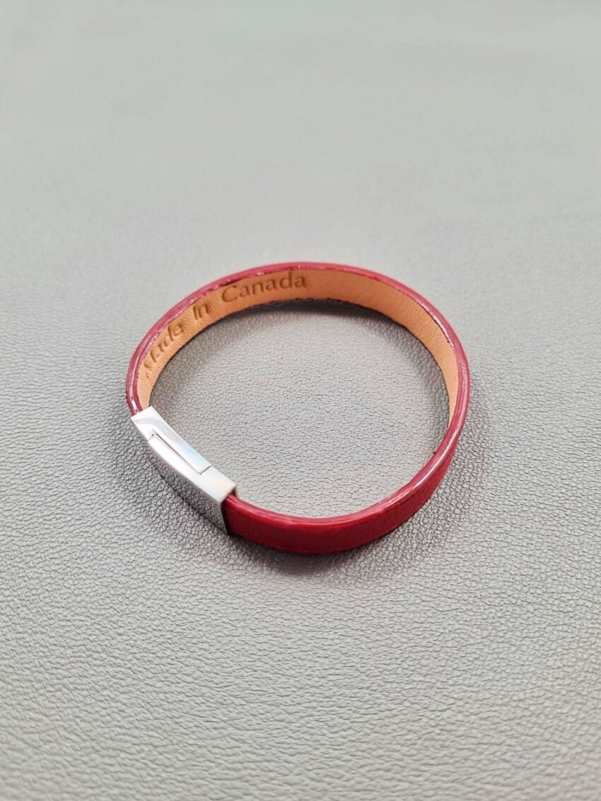 Top view of a luxury red goatskin leather bracelet with a magnetic clasp, made by Pila Luxuria in Canada.