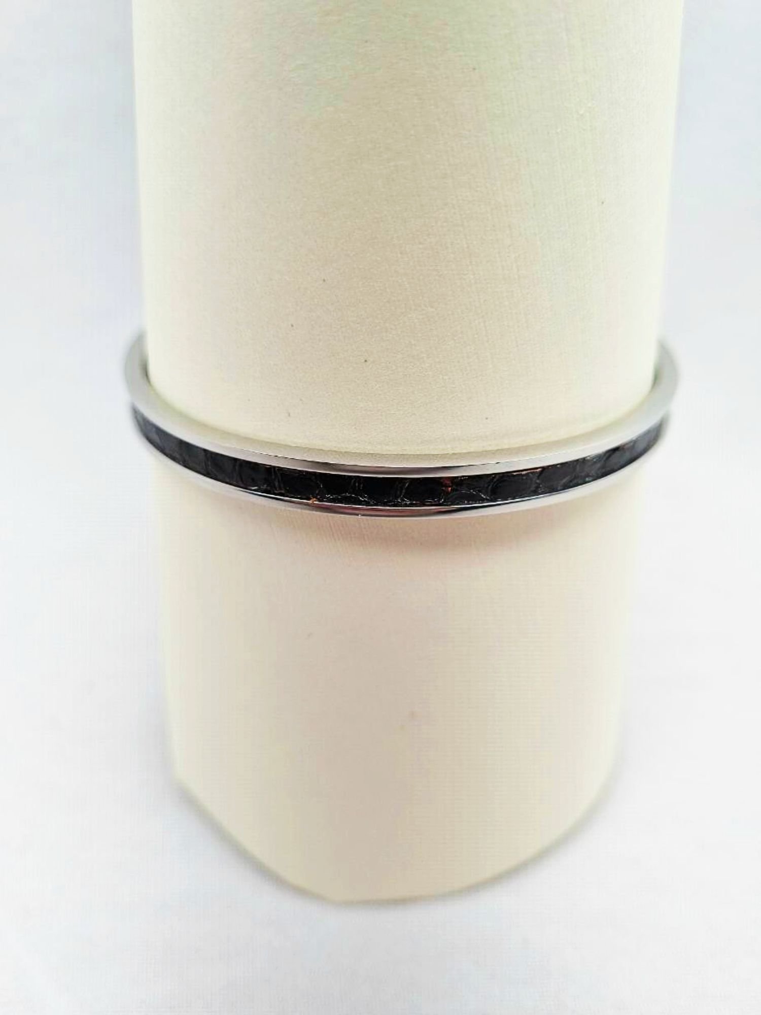 Luxury black python clasp bracelet, made by Pila Luxuria in Canada.