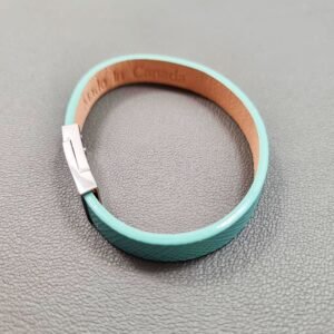 Top view of a luxury tiffany saffiano leather bracelet with a magnetic clasp, made by Pila Luxuria in Canada.