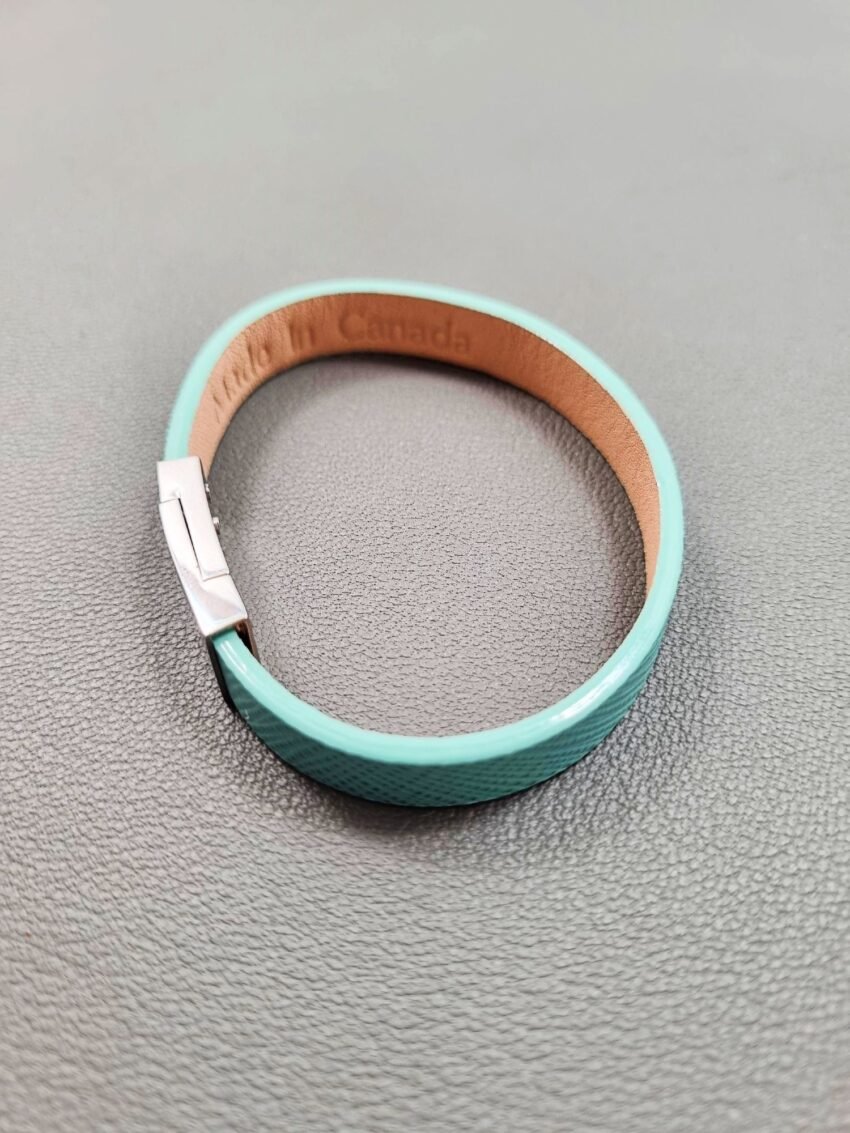 Top view of a luxury tiffany saffiano leather bracelet with a magnetic clasp, made by Pila Luxuria in Canada.