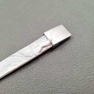 White crocodile lleather bracelet with a silver magnetic clasp, made by Pila Luxuria in Canada.