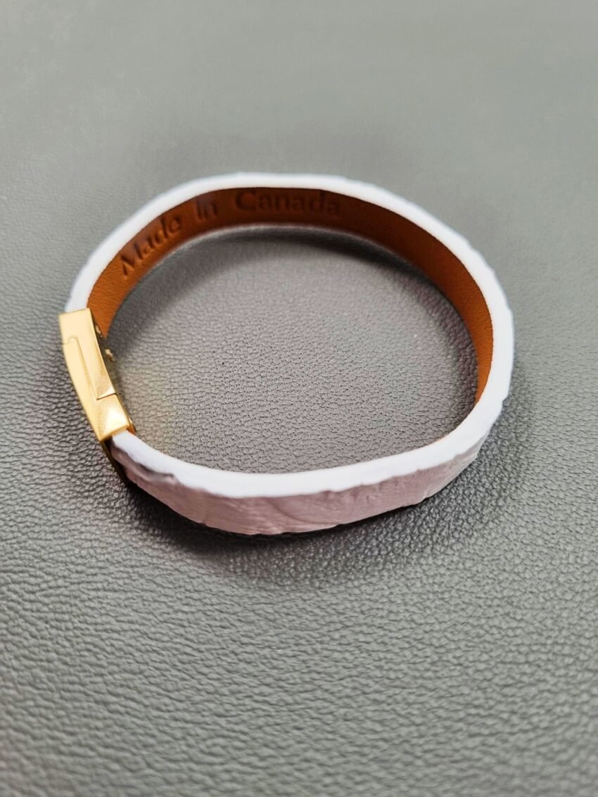 Top view of a luxury white crocodile leather bracelet with a magnetic clasp, made by Pila Luxuria in Canada.