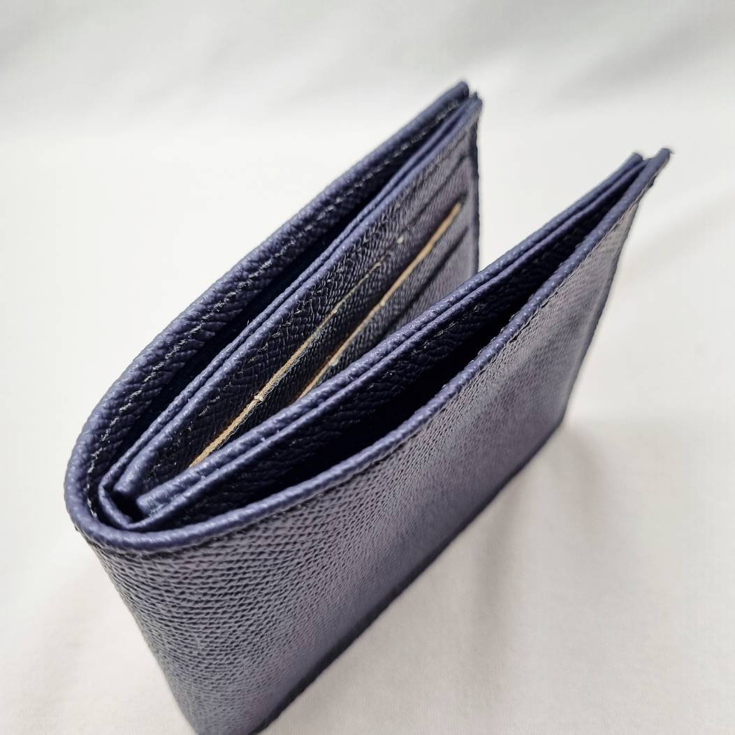 Pila Luxuria Asset Leather Wallet in blue epsom shown from the top down.